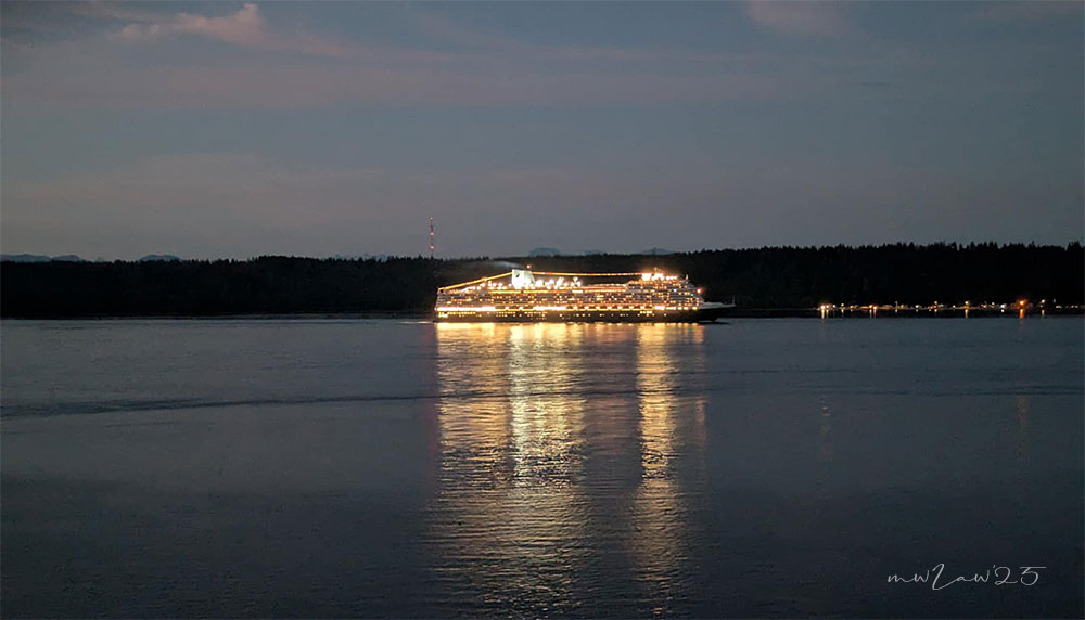 Watching the cruise ships pass at sunset from my balcony.